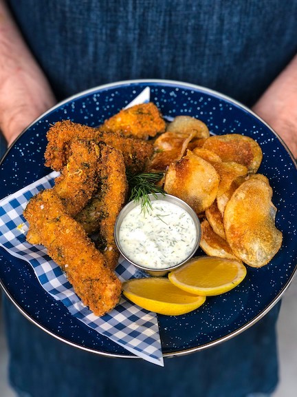 A plate of breaded chicken.